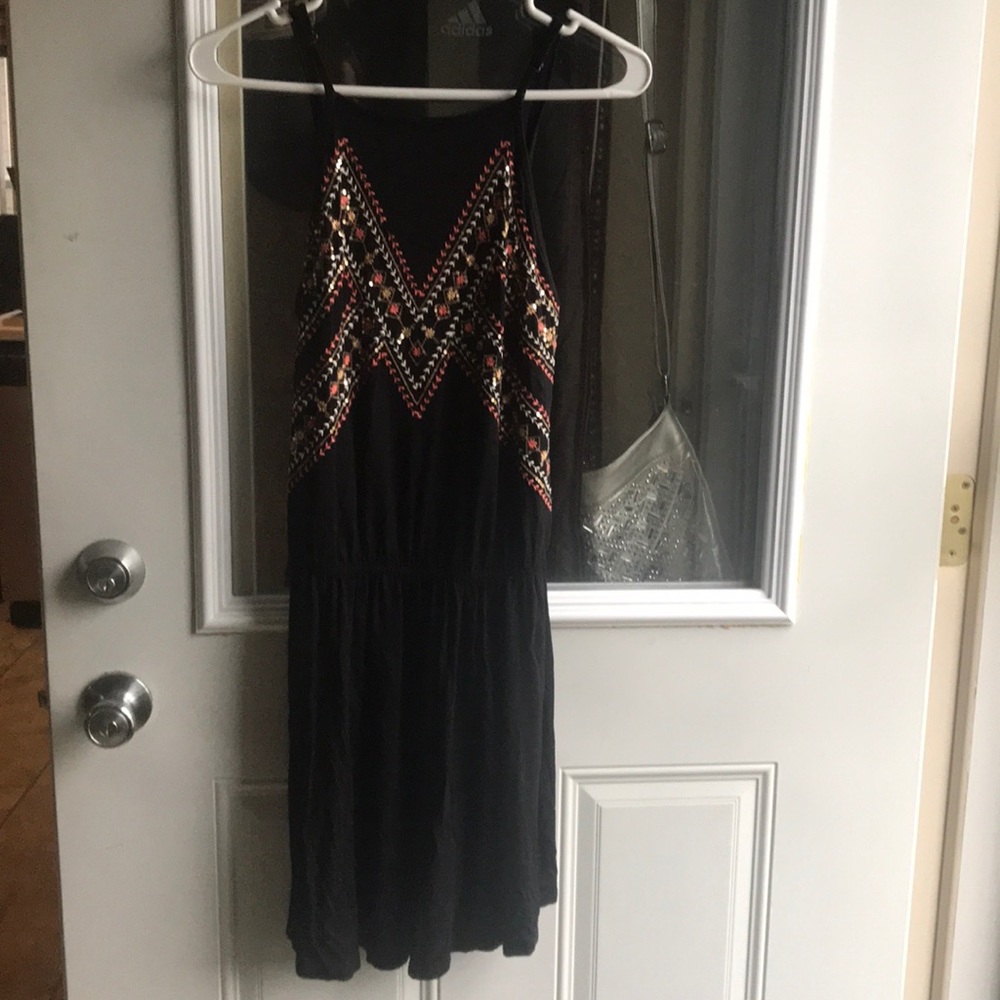 Black dress with coral and gold detail